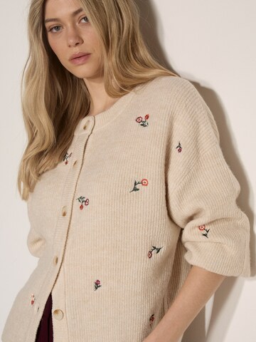 Cardigan ' ' Apricot en gris