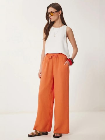 Pantalon 'Hose' Happiness İstanbul en orange : devant