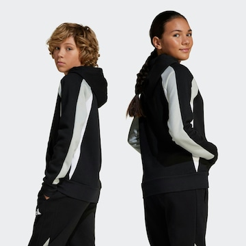 ADIDAS SPORTSWEAR - Camiseta deportiva en negro