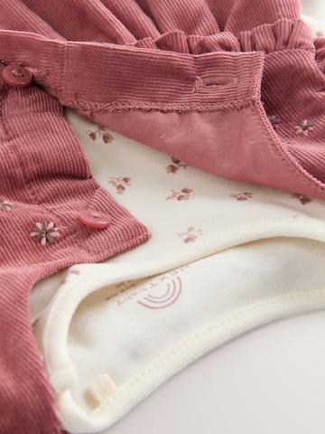 Set Next en rose