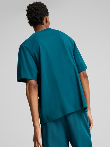 PUMA T-Shirt 'Classics+' in Grün