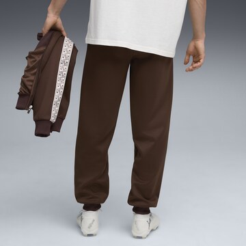 PUMA Tapered Sports trousers 'FC St. Pauli King Anthem' in Brown