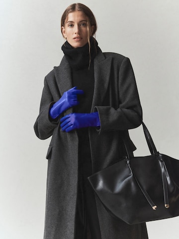 Gants Next en bleu