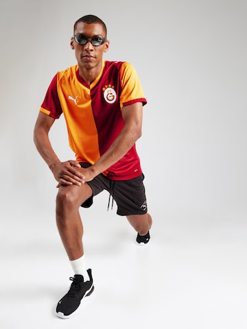 PUMA - Camiseta de fútbol 'GSK Home' en naranja