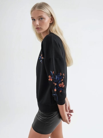 Sweat-shirt Hiccup en noir