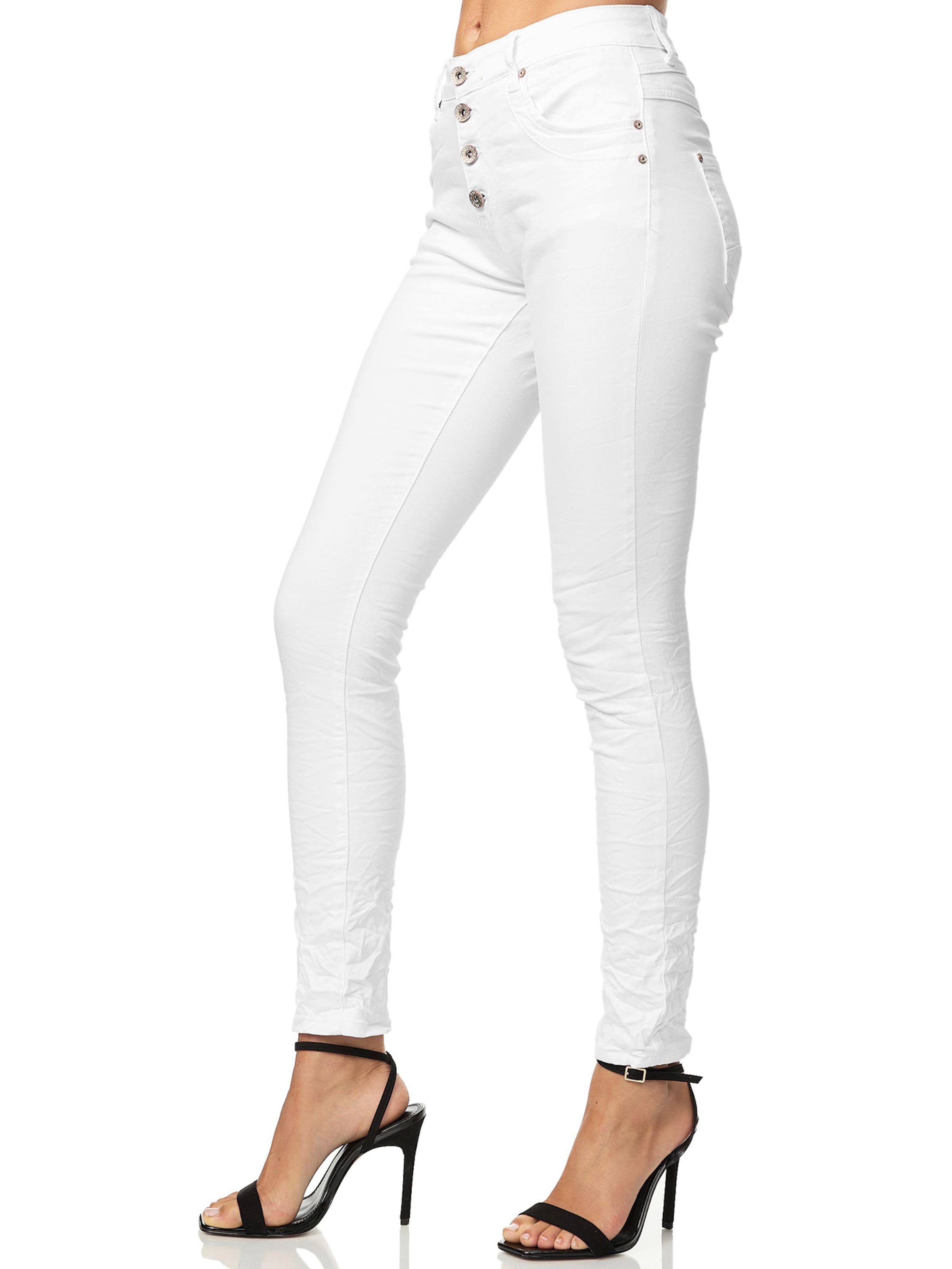 Skinny Jeans di Elara in bianco