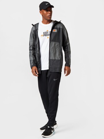 Nike Sportswear Přechodná bunda – šedá