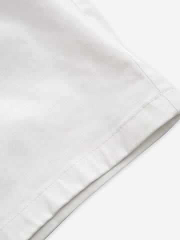 Slimfit Pantaloni chino di Next in bianco