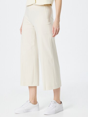 DRYKORN Wide Leg Housut 'TRUE' värissä beige: edessä