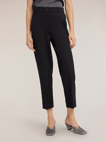 Regular Pantalon MOTIVI en noir