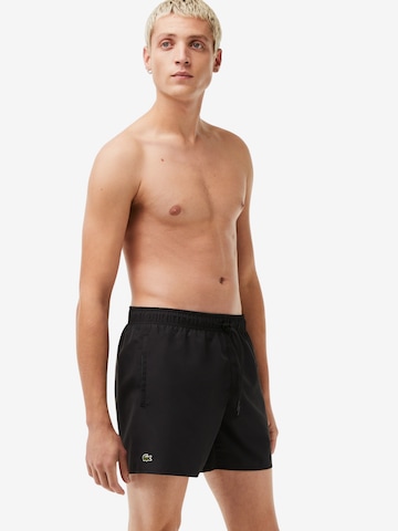 Maillot de bain LACOSTE en noir : devant