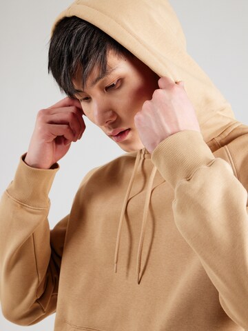 Carhartt WIP Sweatshirt 'Chase' in Bruin