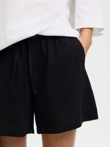 SELECTED - regular Pantalón 'SLFLUISA-LINNIE' en negro