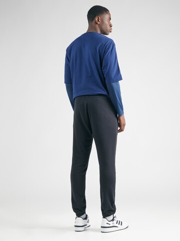 ADIDAS ORIGINALS Tapered Παντελόνι 'Essential' σε μαύρο