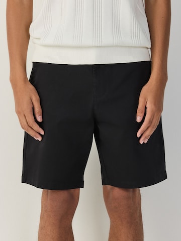 Loosefit Pantalon chino Next en noir