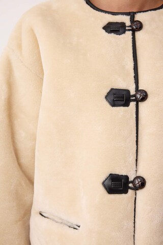 Trendyol Between-Season Jacket in Beige