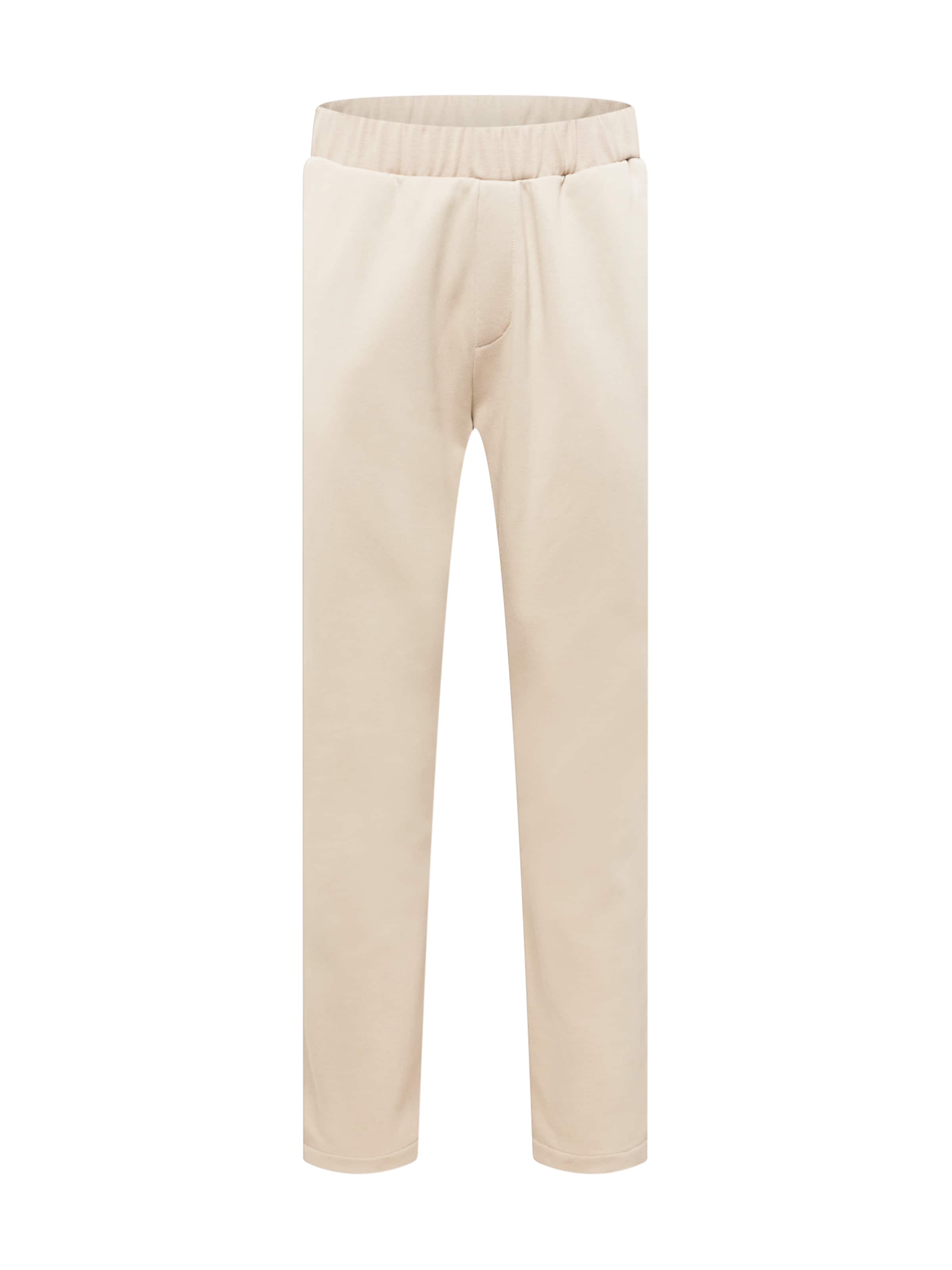 regular Pantaloni di Kosta Williams x About You in beige: frontale