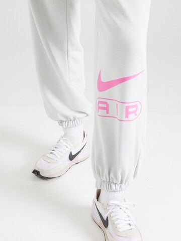 Nike Sportswear Zúžený strih Nohavice 'AIR' - Sivá