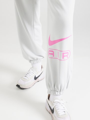 Effilé Pantalon 'AIR' Nike Sportswear en gris