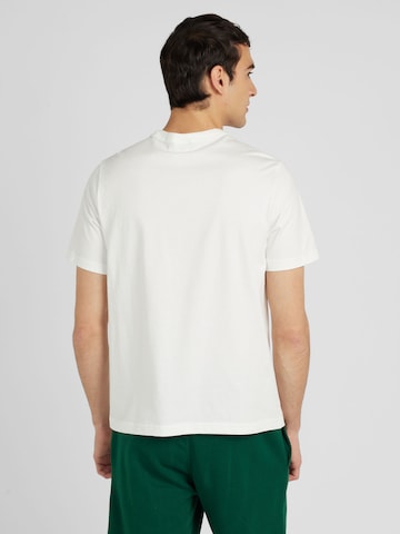 Reebok Performance shirt in White