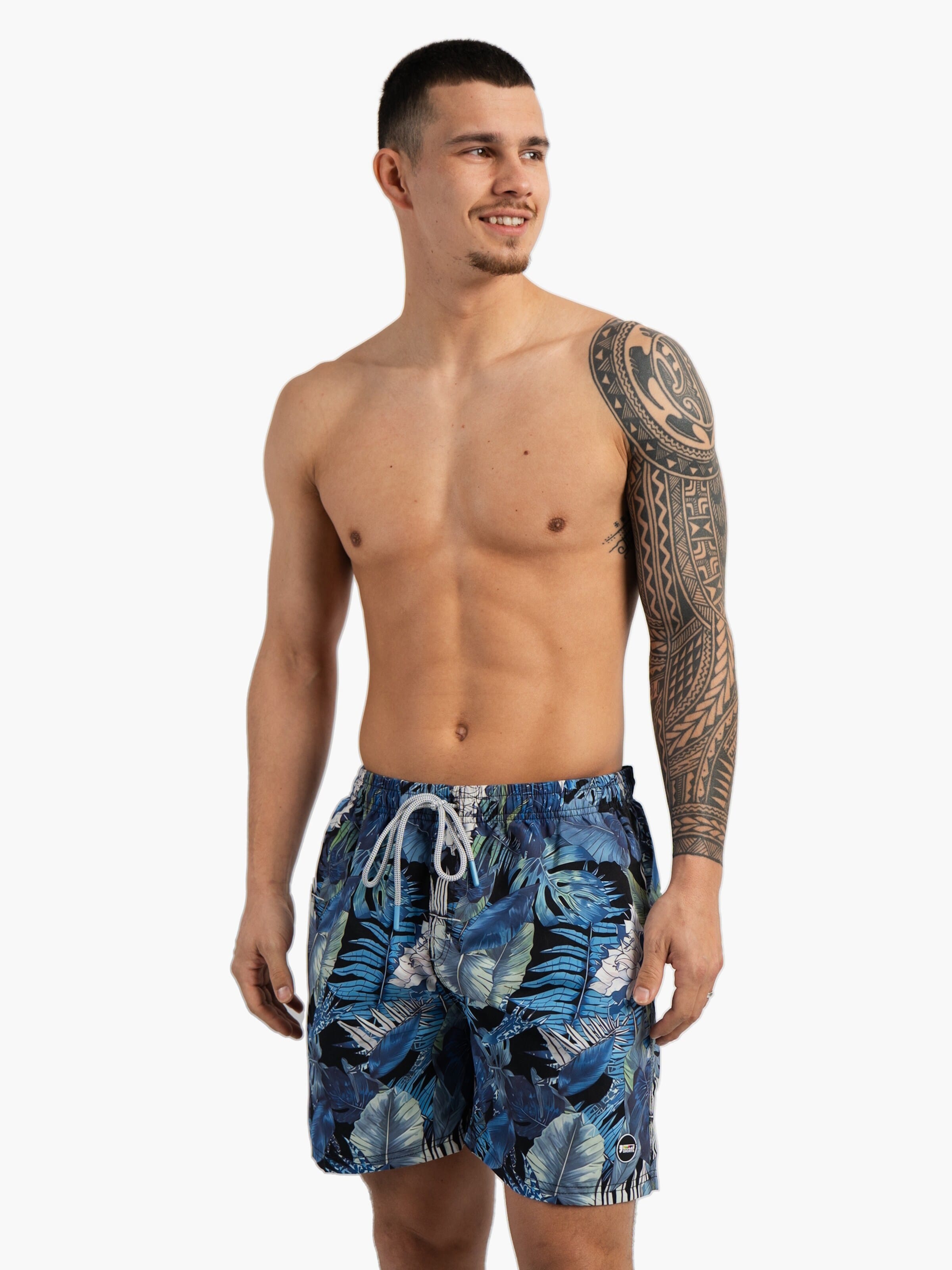 Happy Shorts Board Shorts in Blue: front