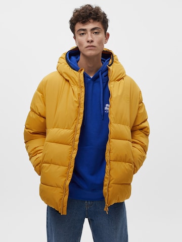 Pull&Bear Winter Jacket in Yellow: front