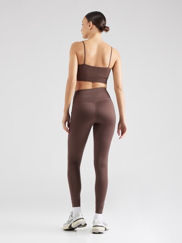 NIKE Skinny Sports trousers in Brown