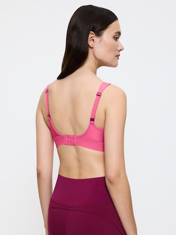 Triumph Triaction T-shirt Sports bra ' Triaction Hybrid Lite ' in Pink