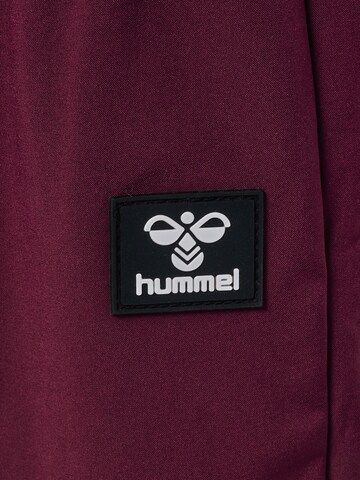 Effilé Pantalon de sport 'Jupitor' Hummel en rouge