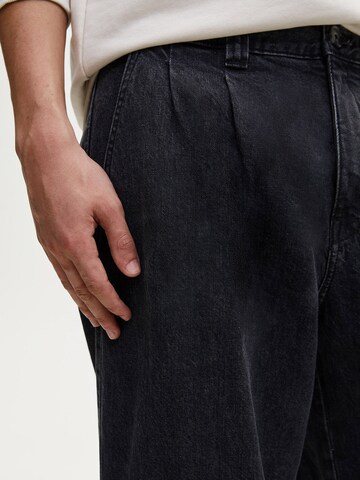 Loosefit Jeans di Pull&Bear in nero