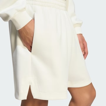 ADIDAS SPORTSWEAR Voľný strih Športové nohavice 'Lux' - Biela