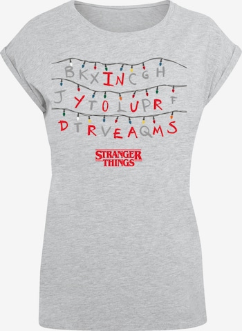 F4NT4STIC T-Shirt 'Stranger Things In Your Dreams Netflix TV Series' in Grau: Vorderseite