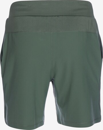 PUMA Loose fit Workout Pants in Green