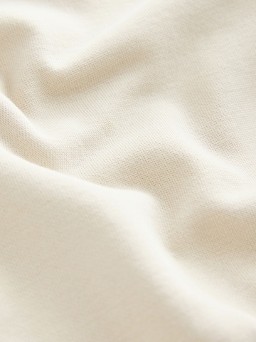 Next Juoksupuku värissä beige