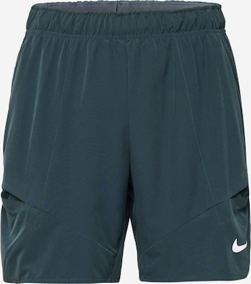 NIKE Regular Sports trousers in Green: front