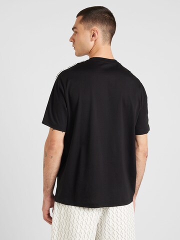 Maglietta di ARMANI EXCHANGE in nero