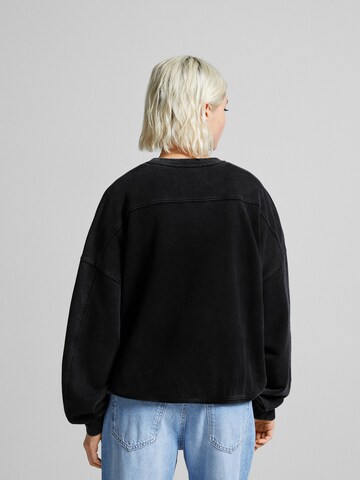 Sweat-shirt Bershka en noir