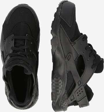 Baskets 'Huarache Run' Nike Sportswear en noir