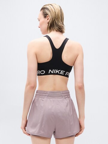 Bustino Reggiseno sportivo 'PRO' di NIKE in nero