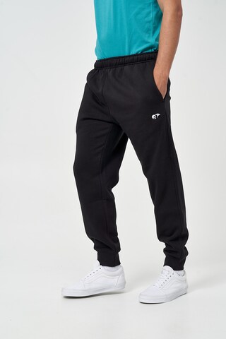 Loosefit Pantaloni 'Panda' di Mikon in nero