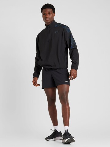 Reebok - Sweatshirt de desporto 'TRAIN MOTION' em preto