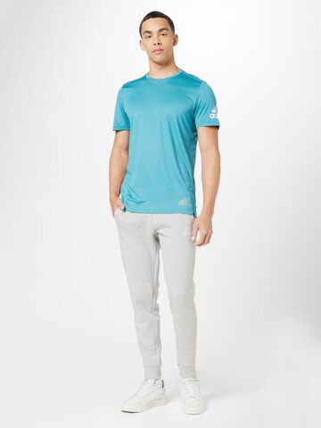 ADIDAS SPORTSWEAR Funkcionalna majica 'Run It' | modra barva