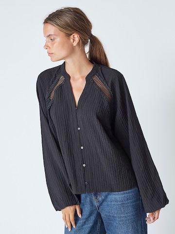 Chemisier 'Shina' co'couture en noir : devant
