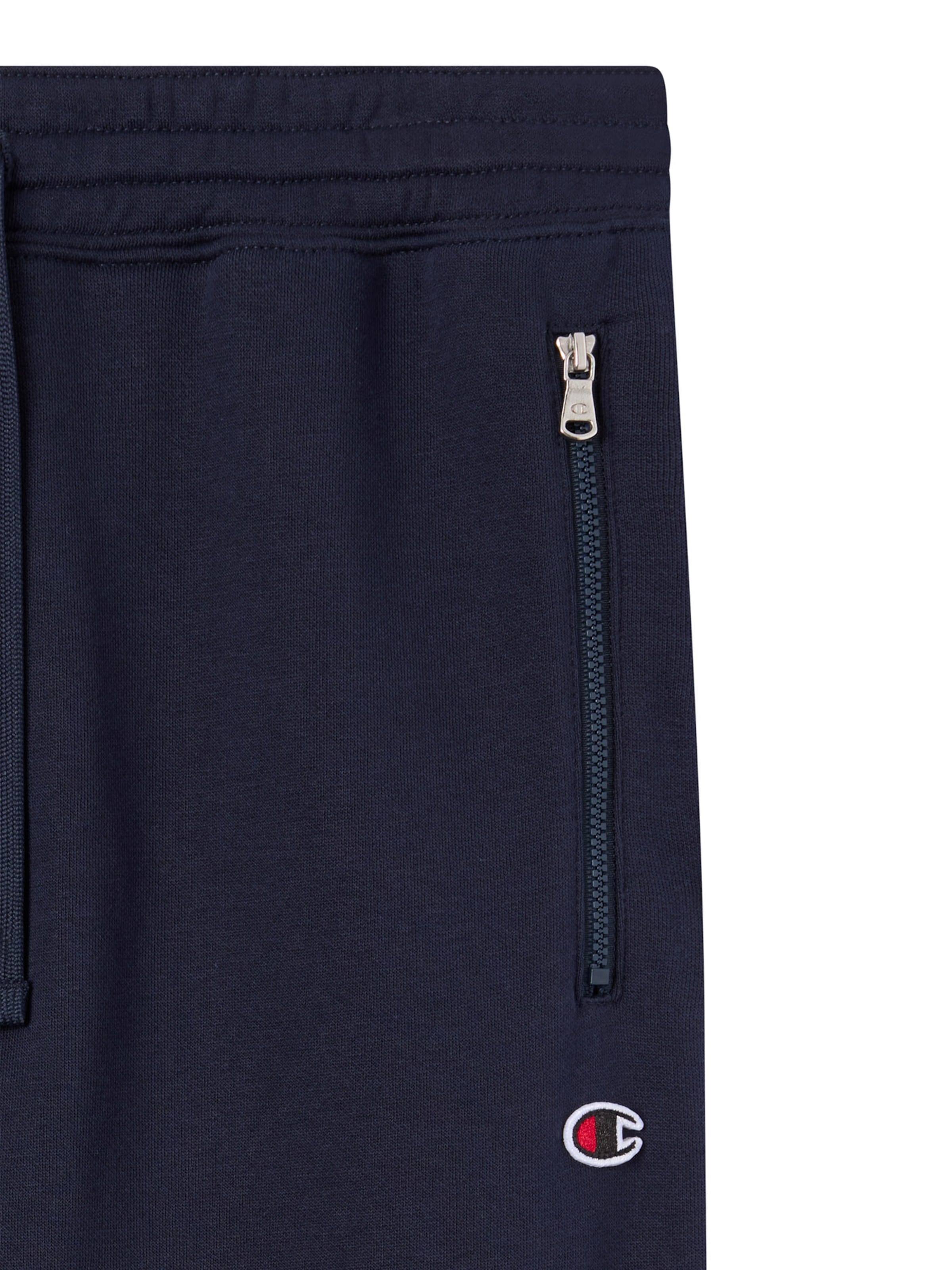 Champion Authentic Athletic Apparel Tapered Byxa i blå