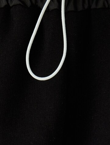 Koton Wide Leg Hose in Schwarz