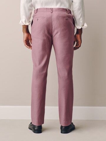 Slimfit Pantaloni con piega frontale di Next in rosa