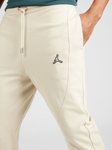 Slimfit Pantaloni sportivi 'Essential' di Jordan in beige