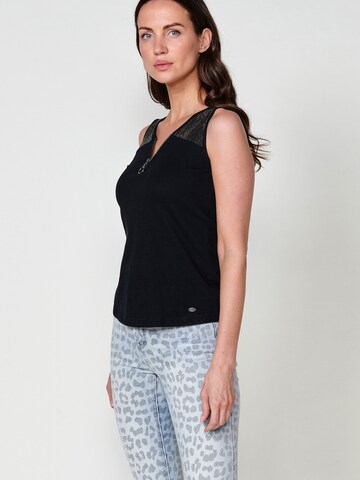 Top di KOROSHI in nero