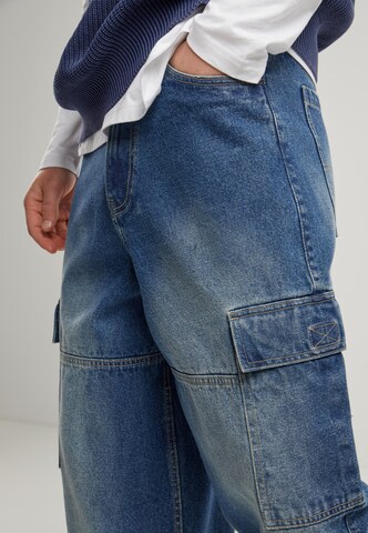 Loosefit Jeans cargo di Urban Classics in blu