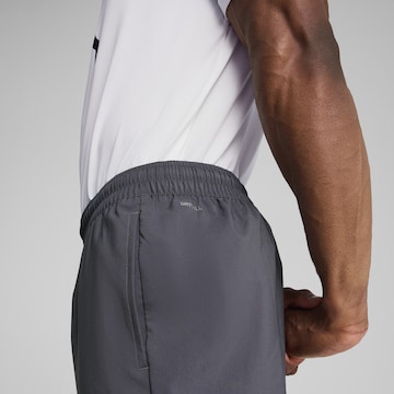 PUMA Tapered Sportbroek 'TAD Essentials' in Grijs